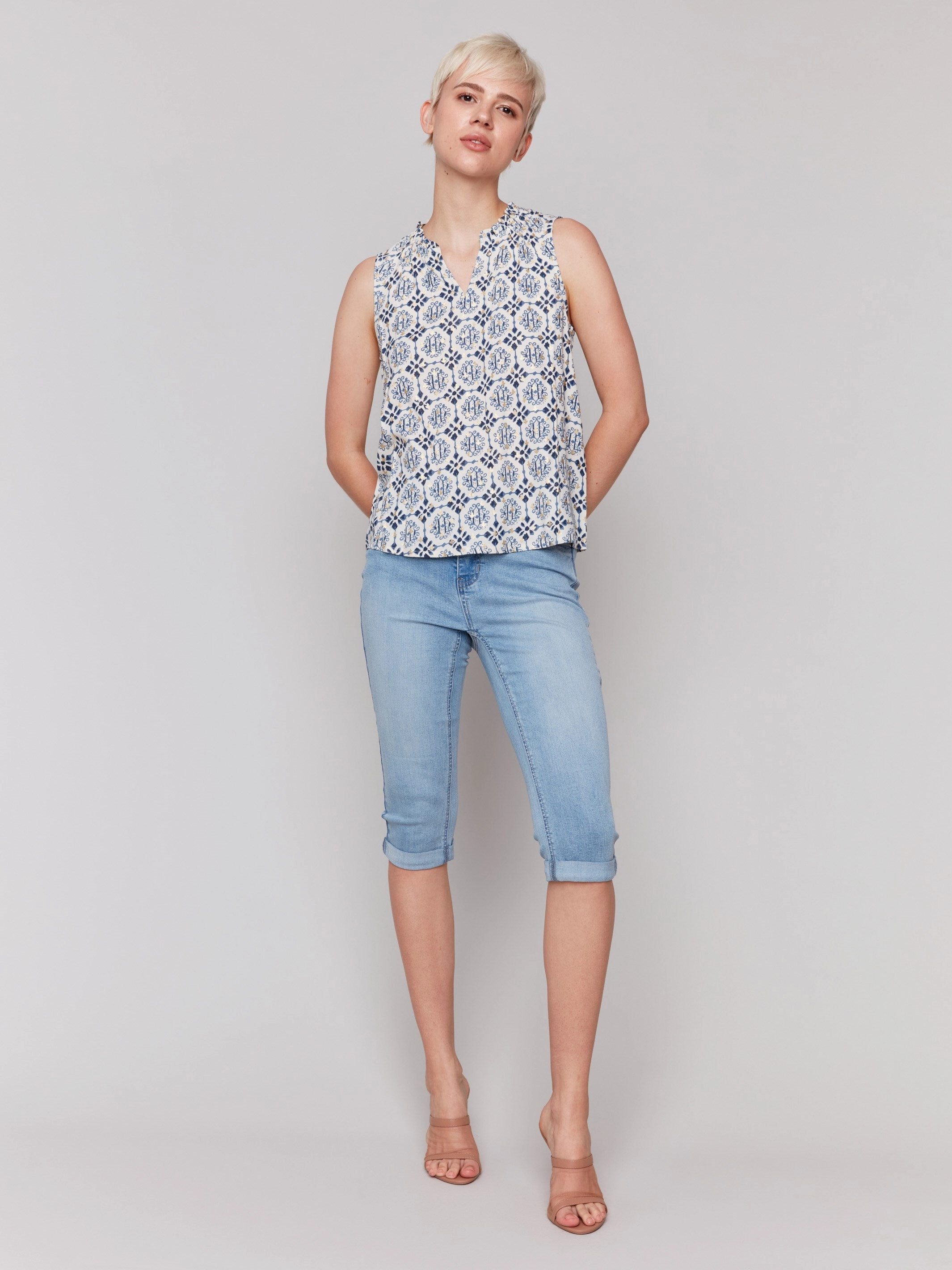 Statement Maker Subtle pattern Printed Sleeveless Ruffle Neck Top - Ornament